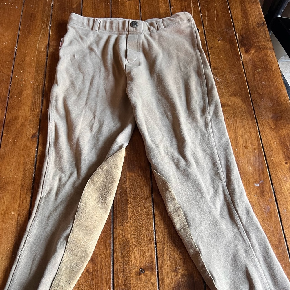 Equistar kids pull on riding pants.